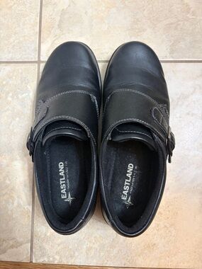 Eastland Black Slip-On Loafers with Buckle Accent